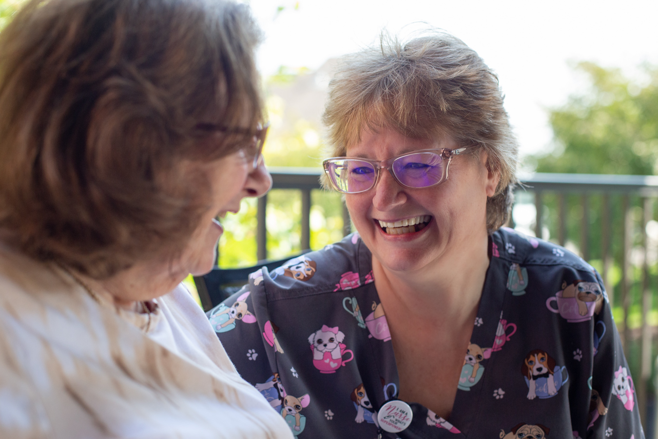 Resident with nurse outdoors