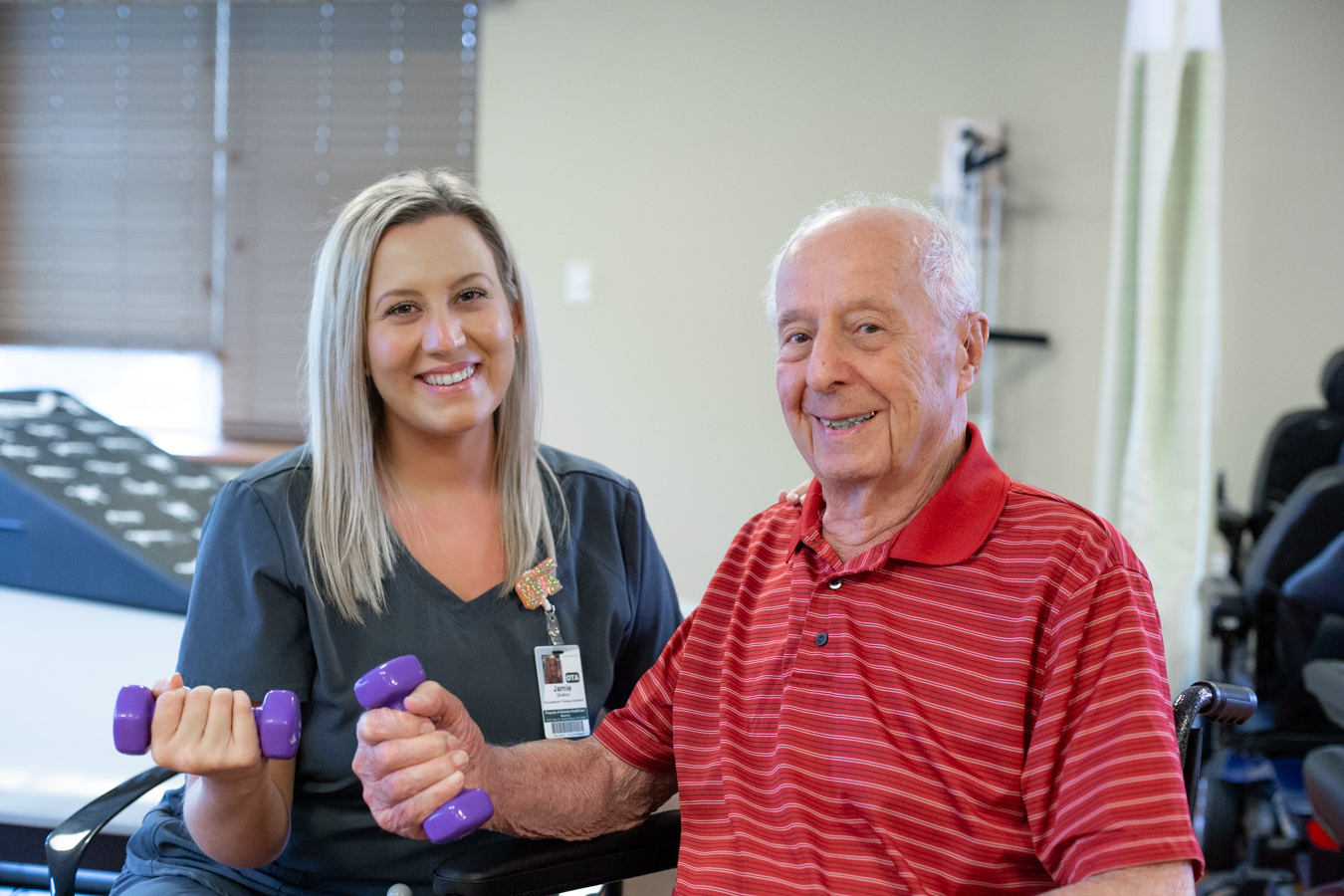 Man working with physical therapist