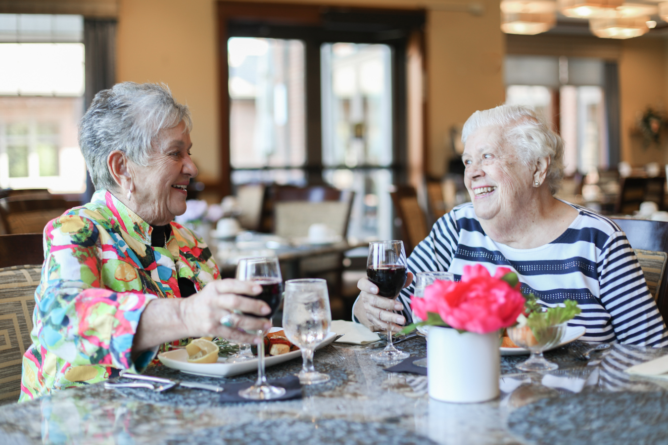 Women eating lunch together in dining room