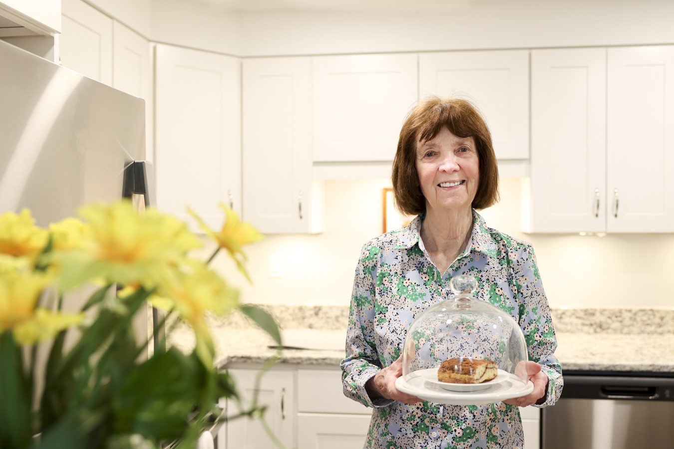 Woman holding plate with food